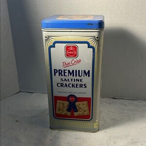 Vintage Tin with Child in Yellow Coat